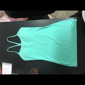 Lululemon tank. Never been worn! Comes with pads.